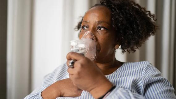 Patient with nebulizer