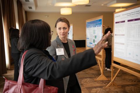 Nurses at nursing conference, poster presentation