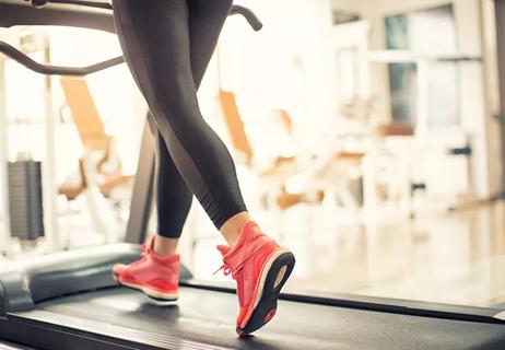 Person walking on treadmill.