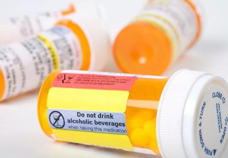 Medication with extra black box warning labels on container