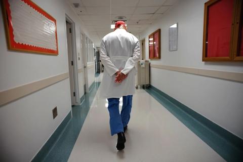 Doctor walking in hallway