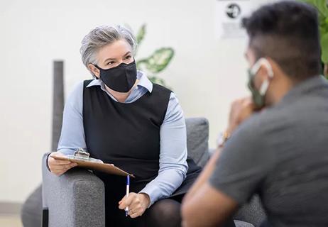 Therapist Wearing a Face Mask Stock Photo