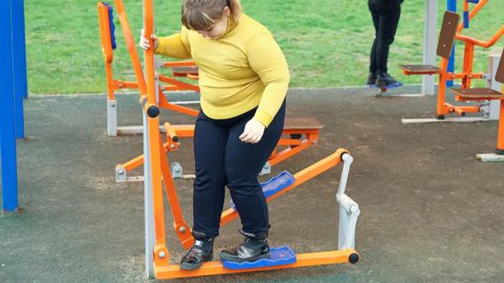 Child on playground equipment