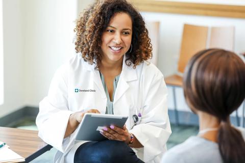 Physician speaking with patient