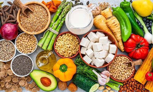 An array of meatless foods in different vessels on table