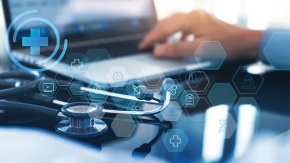 doctor hand on laptop