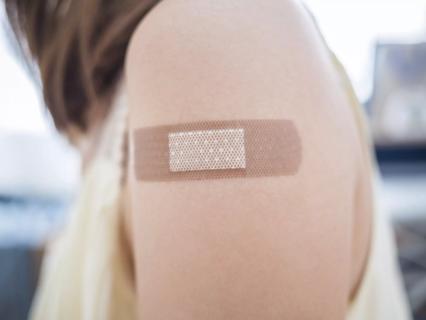 Nurse giving a vaccine