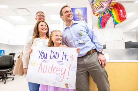 Pediatric cancer survivor with Dr. Seth Rotz