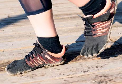 Runner with shoes that have the toe splits built into the design.