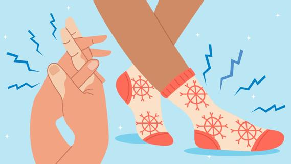 Cold hands clasped together and cold feet in socks