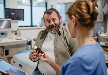 Patient smiling at nurse