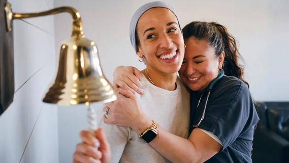 Patient with cancer celebrating end of treatment