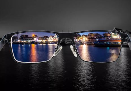 Colorblind glasses showing houses on shoreline in color