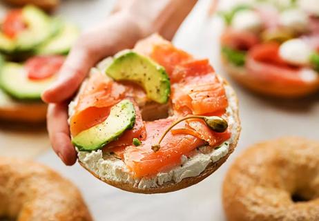 healthy bagel with vitamin D rich salmon on top