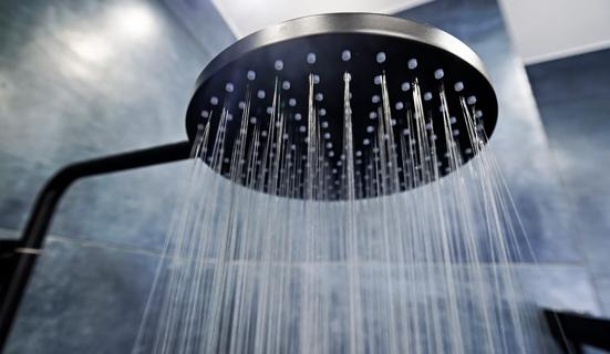 Large shower head with water running out
