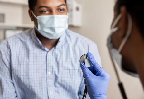 Black adolescent at doctor's office