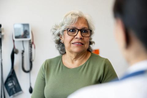 Older woman talking with healthcare provider