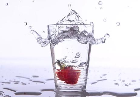 water with a strawberry in it