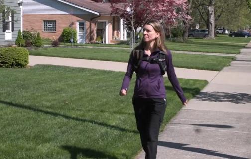 Person walking with weighted vest