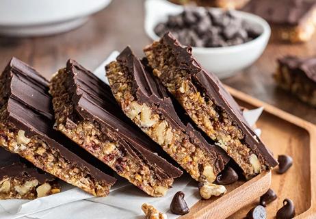 Rectangular chocolate and walnut bars with chocolate frosting