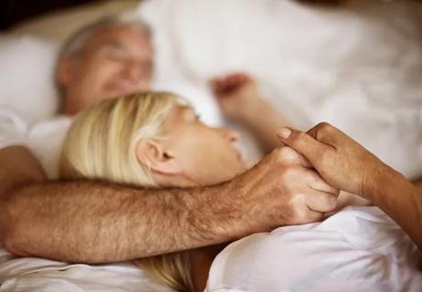 couple affectionate in bed