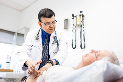 Dr. Chatterjee with patient