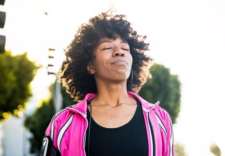 woman take deep breathes to relieve stress