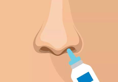 Closeup of nasal tanning spray being used in nose.