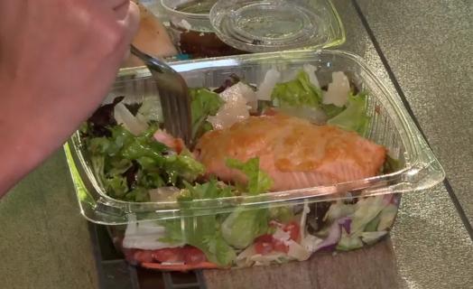 Person eating a salad