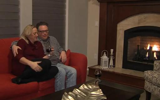 Couple sitting fireside