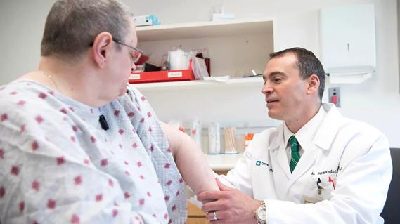 Dr. Fernandez with patient