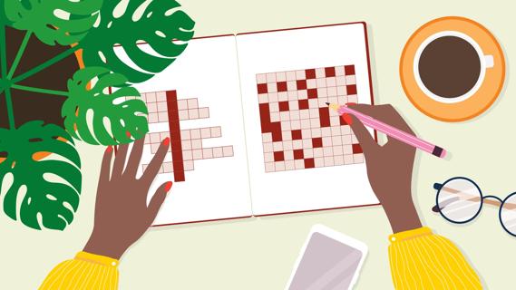 Person doing a crossword puzzle, with plant, cup of coffee, cell phone and glasses nearby