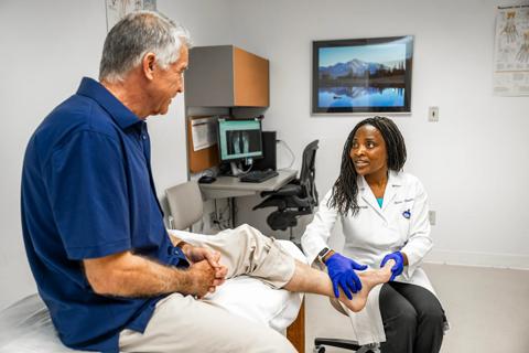 Doctor examining patient's foot