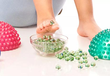 Toes picking up marbles flat feet exercise