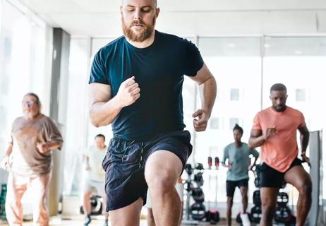 Group exercise class at gym.