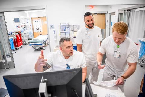 Caregivers having a discussion on a unit