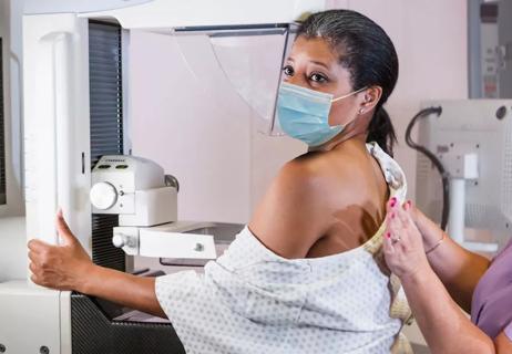 woman getting a mammogram