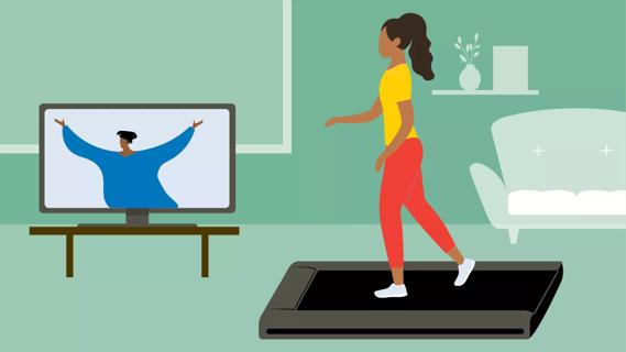 Person on walking pad in living room, with TV on