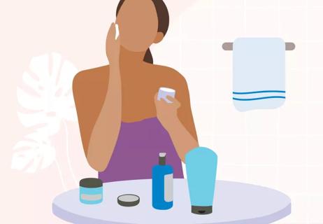 Person applying acidic skin care products to skin after bathing.