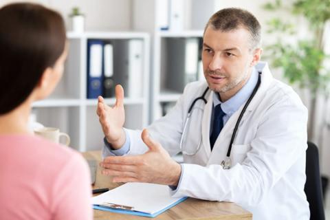Healthcare provider explaining to patient