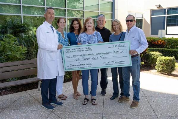 Lenny Schelin Jr. Memorial Tournament Check Presentation