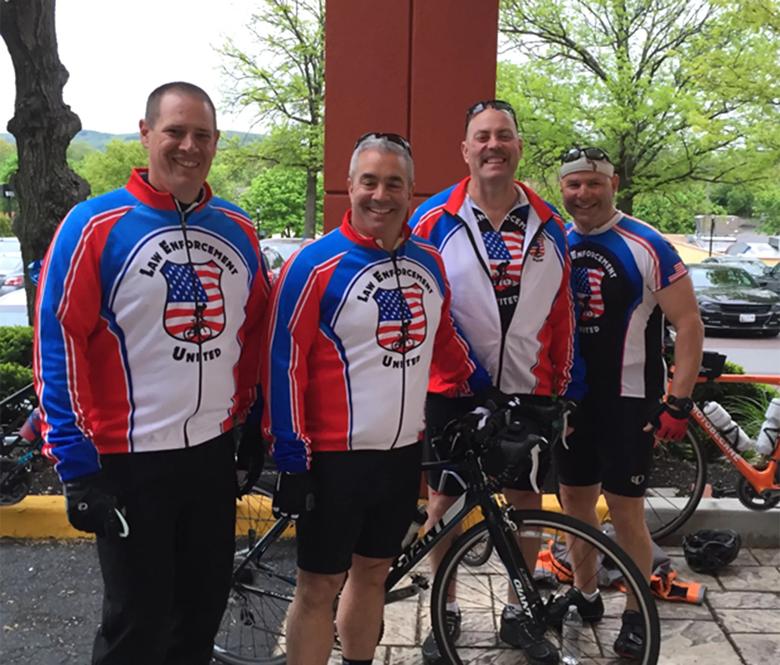 Jim Mariano and fellow police officers during bike ride
