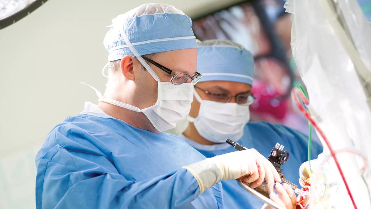 Dr. Andre Machado performing surgery