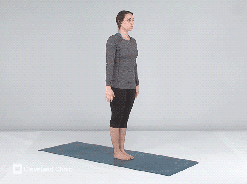 Person doing yoga chair pose
