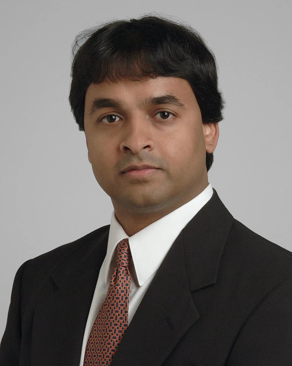 Neil Cherian, MD