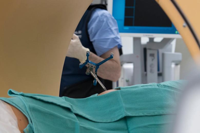 Patient lying on table for CT scan