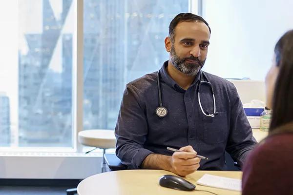 Doctor talking with a patient.
