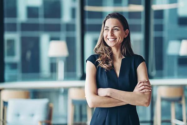 Woman crossing her arms and smiling