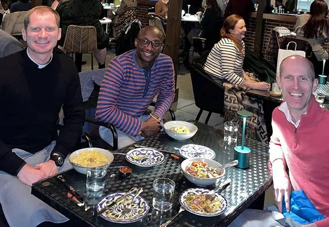 Dr. Costello, his brother and a friend at a dinner in D.C.
