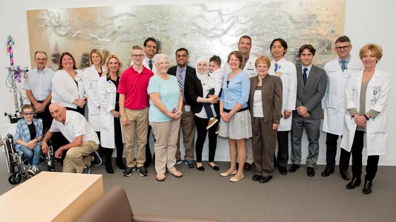 pediatric liver transplant medical team with donor and recipient